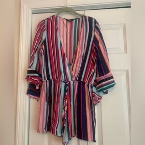 Express romper worn twice- has a built in string like belt to cinch at waist.